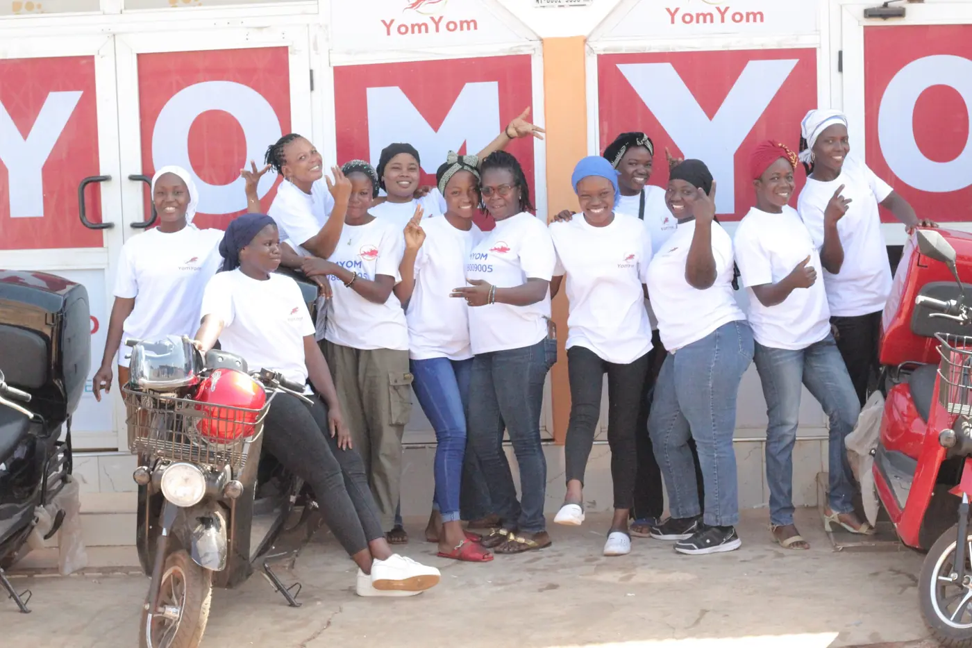 YomYom women riders outside the YomYom office